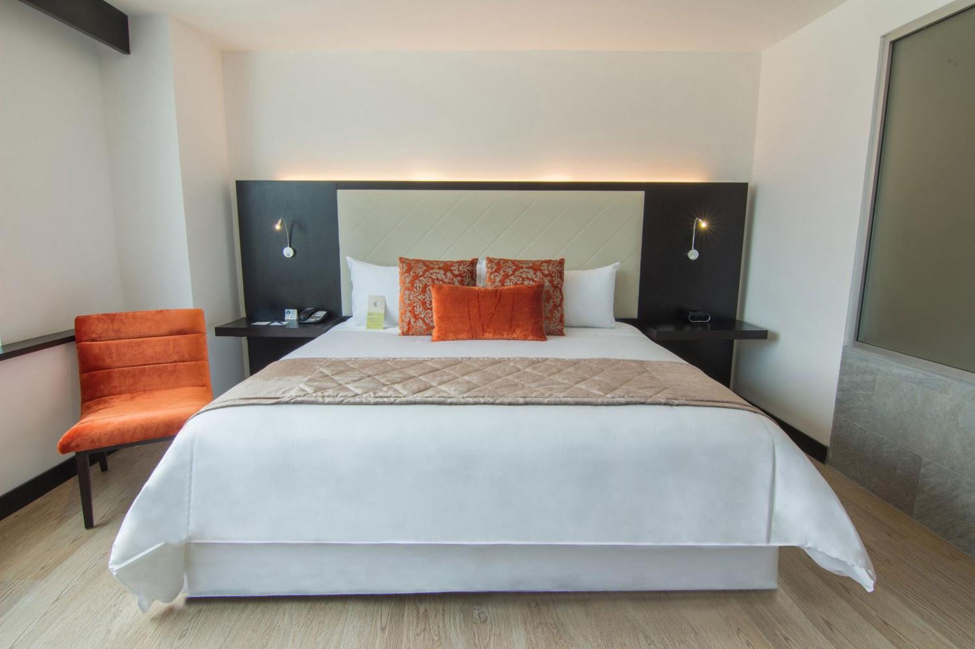 Four Points By Sheraton Cuenca Exterior foto A bedroom at the hotel